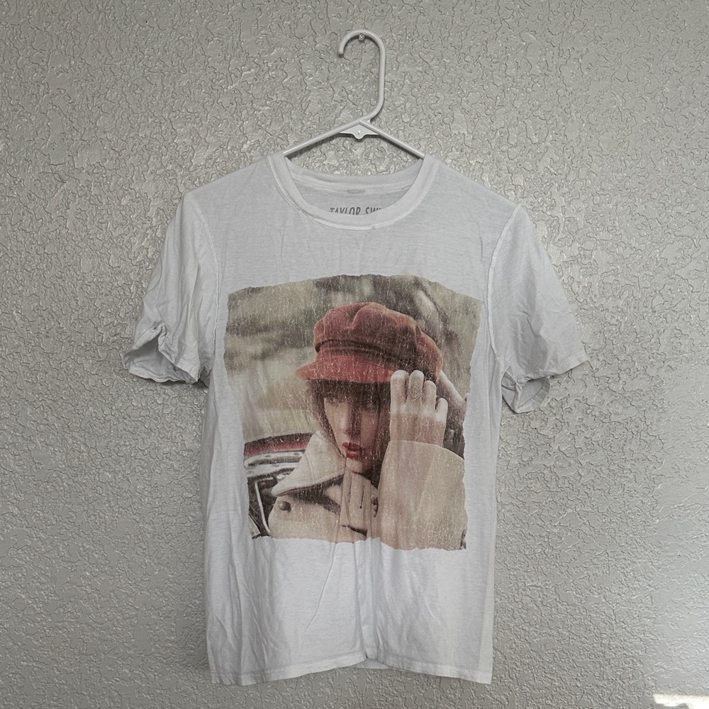 Taylor Swift White Graphic Tee with Red Hat Design